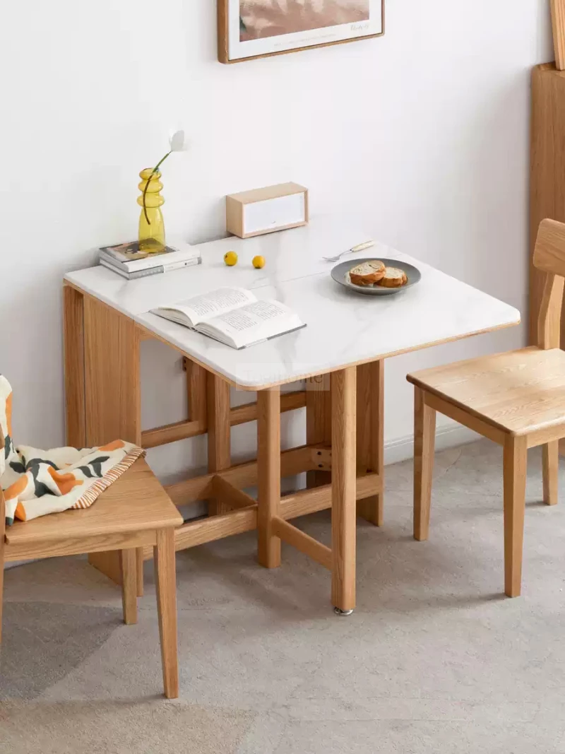 Bàn Ăn Gấp Mở Thông Minh Gỗ Tự Nhiên Mặt Đá Hiện Đại Togismart BA096 làm từ gỗ tự nhiên bền chắc, kết hợp mặt đá hiện đại sang trọng. Thiết kế gấp mở linh hoạt giúp tiết kiệm diện tích, phù hợp căn hộ chung cư và gia đình hiện đại, mang lại sự tiện nghi và điểm nhấn tinh tế cho phòng ăn.