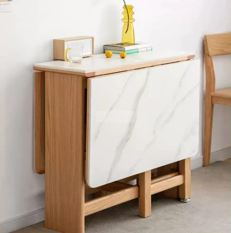 Bàn Ăn Gấp Mở Thông Minh Gỗ Tự Nhiên Mặt Đá Hiện Đại Togismart BA096 làm từ gỗ tự nhiên bền chắc, kết hợp mặt đá hiện đại sang trọng. Thiết kế gấp mở linh hoạt giúp tiết kiệm diện tích, phù hợp căn hộ chung cư và gia đình hiện đại, mang lại sự tiện nghi và điểm nhấn tinh tế cho phòng ăn.