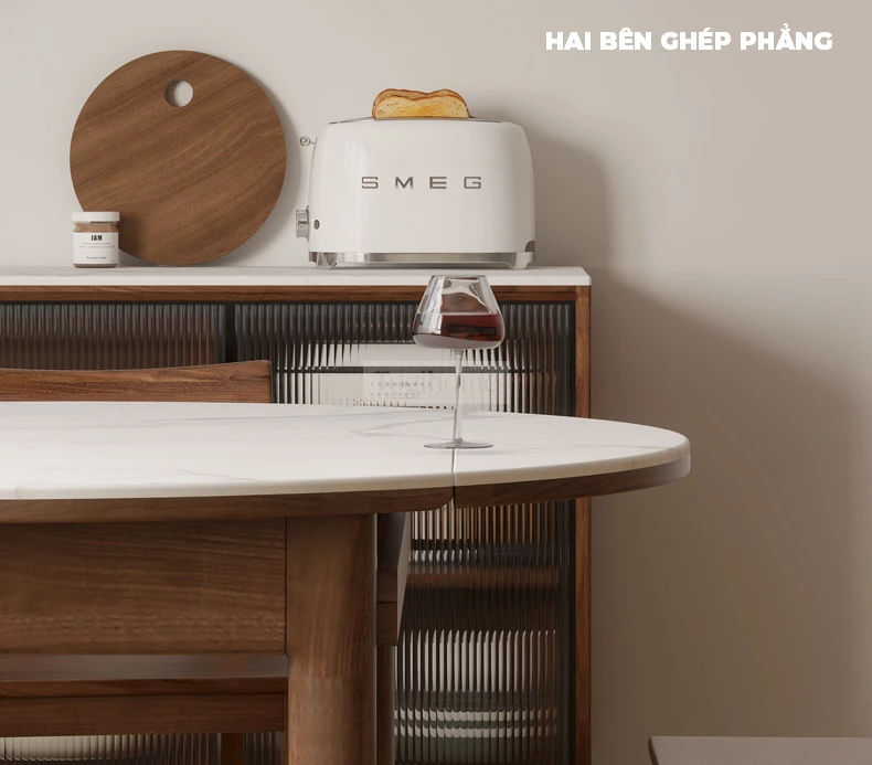 Bàn Ăn Gấp Vuông Tròn Gỗ Tự Nhiên Mặt Đá Togismart BA211 thiết kế thông minh, linh hoạt từ dạng vuông sang tròn, phù hợp nhiều không gian. Chất liệu gỗ tự nhiên bền chắc kết hợp mặt đá sang trọng, dễ vệ sinh, mang lại sự tiện nghi và điểm nhấn hiện đại cho phòng ăn.