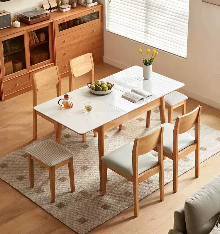 Bàn Ăn Gỗ Tự Nhiên Mặt Đá Tự Nhiên Hiện Đại Togismart BA 088 để bạn đăng lên website:  Bàn ăn gỗ tự nhiên Togismart BA 088 kết hợp mặt đá tự nhiên cao cấp, mang đến vẻ đẹp hiện đại và sang trọng. Thiết kế chắc chắn, tinh tế phù hợp với nhiều không gian sống. Sản phẩm lý tưởng cho những gia đình yêu thích phong cách tối giản, bền vững và đẳng cấp.