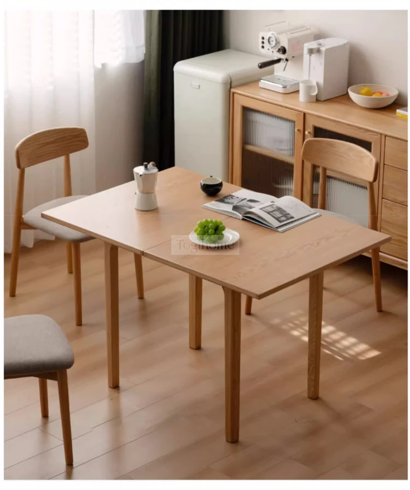 Bàn Ăn Gỗ Tự Nhiên Thông Minh Gập Mở Linh Hoạt Togismart BA218 thiết kế hiện đại, tiết kiệm không gian và dễ dàng điều chỉnh kích thước. Sản phẩm làm từ gỗ tự nhiên bền chắc, phù hợp gia đình nhỏ hoặc căn hộ chung cư, mang lại sự tiện nghi và thẩm mỹ cho phòng ăn.