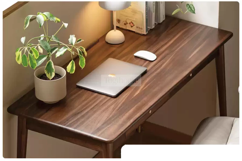 Bàn Làm Việc Gỗ Tự Nhiên Togismart BTG 066 – Thiết kế thanh lịch với chất liệu gỗ tự nhiên cao cấp, đường nét tinh giản, phù hợp cho không gian hiện đại. Mặt bàn rộng rãi, tiện lợi cho làm việc, học tập, mang lại cảm hứng và hiệu quả trong từng giờ làm việc.