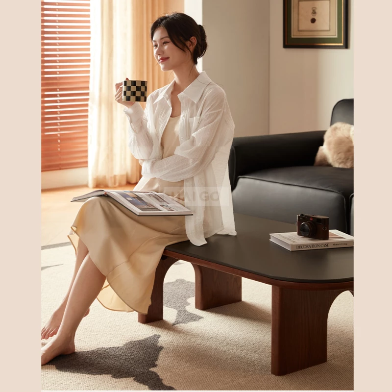https://api.togihome.vn/storage/images/originals/ban-tra-go-tu-nhien-thiet-ke-thanh-lich-toi-gian-cbk3-4-wqga0jmluvfs3gk.webp