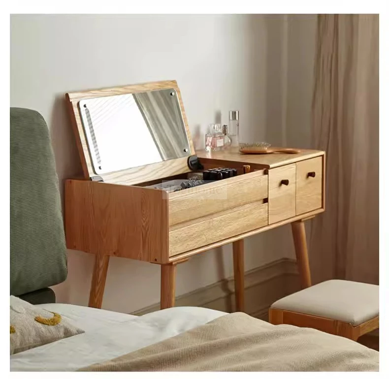 Bàn Trang Điểm Gỗ Tự Nhiên Phong Cách Hiện Đại Togismart TDM153 mang thiết kế tinh tế, sang trọng, phù hợp phòng ngủ trẻ trung. Chất liệu gỗ tự nhiên bền chắc, chống cong vênh, kết hợp gương và ngăn kéo tiện dụng, giúp sắp xếp gọn gàng và tạo điểm nhấn đẳng cấp cho không gian.