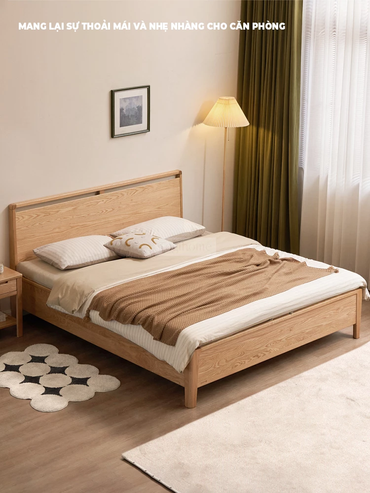 Giường Ngủ Gỗ Tự Nhiên Phong Cách Hiện Đại Togismart GM 082 kết hợp thiết kế tinh tế và chất liệu gỗ cao cấp, mang lại vẻ đẹp sang trọng, bền bỉ. Kiểu dáng tối giản phù hợp với nhiều phong cách nội thất, giúp không gian phòng ngủ thêm ấm cúng và hiện đại.