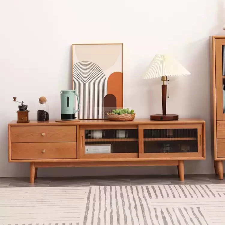 Kệ Tivi Gỗ Tự Nhiên Kính Sóng Cao Cấp Togismart KTV 127 – Thiết kế hiện đại với đường nét bo tròn mềm mại, chất liệu gỗ tự nhiên kết hợp kính sóng sang trọng. Sản phẩm mang lại điểm nhấn tinh tế cho phòng khách, phù hợp nhiều không gian nội thất từ cổ điển đến tối giản.