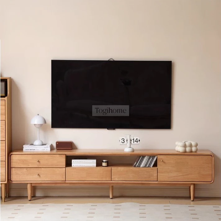 Kệ Tivi Gỗ Tự Nhiên Phong Cách Hiện Đại Togismart KTV 115 làm từ gỗ tự nhiên cao cấp, thiết kế hiện đại, đường nét tối giản. Màu sắc trang nhã, phù hợp nhiều không gian nội thất. Tích hợp ngăn chứa tiện dụng, giúp sắp xếp đồ dùng gọn gàng, mang lại sự tinh tế và sang trọng cho phòng khách.