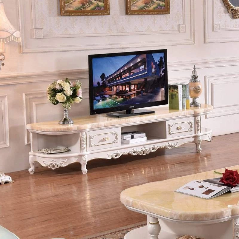 Kệ tivi tân cổ điển màu trắng sang trọng kết hợp với mặt đá tạo lên sự đẳng cấp cho phòng khách