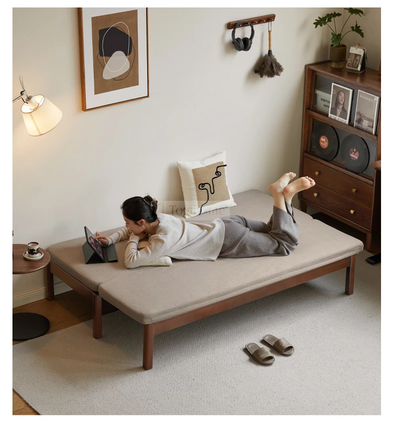 Sofa Phòng Khách Gỗ Tự Nhiên Gấp Mở Hiện Đại Togismart M85 thiết kế thông minh, khung gỗ chắc chắn, dễ dàng chuyển đổi từ ghế thành giường tiện lợi. Chất liệu gỗ bền đẹp, đệm êm ái, kiểu dáng hiện đại giúp tiết kiệm không gian và mang lại sự sang trọng cho phòng khách.