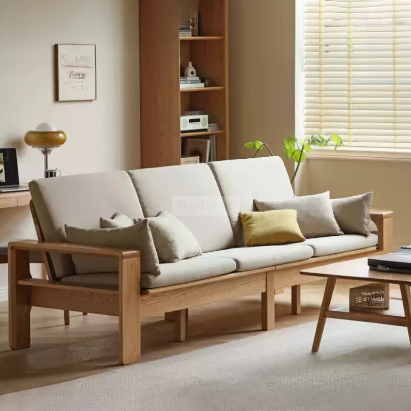 Sofa phòng khách gỗ tự nhiên hiện đại Togismart M66 sở hữu thiết kế tinh gọn, thanh lịch với đường nét tối giản. Chất liệu gỗ tự nhiên cao cấp kết hợp đệm ngồi thoải mái mang lại trải nghiệm thư giãn hoàn hảo. Thích hợp cho không gian hiện đại, sang trọng và tiện nghi.