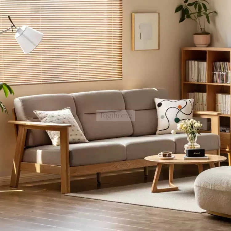 Sofa phòng khách gỗ tự nhiên hiện đại Togismart M68 nổi bật với thiết kế tinh giản, chất liệu gỗ tự nhiên bền đẹp, kết hợp đệm ngồi êm ái. Mẫu sofa lý tưởng cho không gian sống hiện đại, mang lại sự ấm áp, tiện nghi và sang trọng cho phòng khách của bạn.