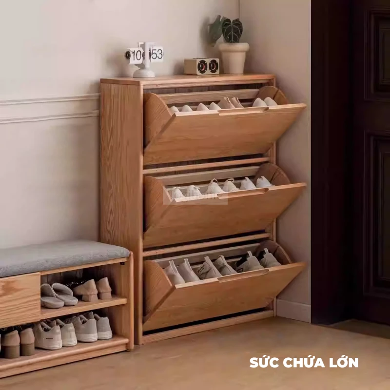 Tủ Để Giày Gỗ Tự Nhiên Cao Cấp Togismart TDG 112 thiết kế hiện đại, sang trọng, phù hợp nhiều không gian sống. Chất liệu gỗ tự nhiên bền chắc, chống cong vênh, giúp bảo quản giày dép gọn gàng, ngăn nắp. Sản phẩm vừa tiện dụng vừa tạo điểm nhấn tinh tế cho ngôi nhà.